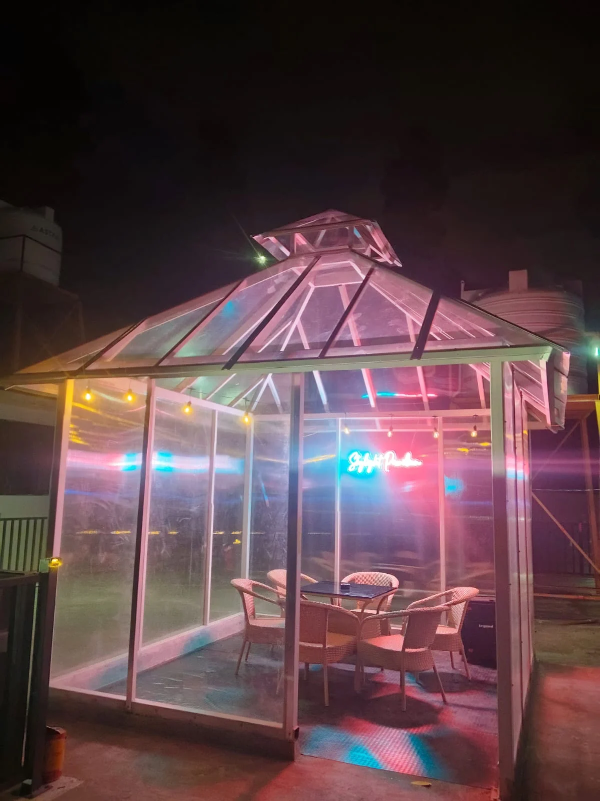The Sky Pavilion lit at night